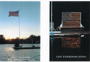 A pair of pictures. The one of the left is in the daytime and shows a raft on Silver Lake with an American Flag. The one on the left is in the nighttime and shows the same right but with an American Flag made of lights. Created by Pat's son, Ed. Pat's grandson, Ken enlisted after the 9-11 attacks.