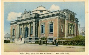 The front of a postcard depicting the Public Library of St. John, New Brunswick. Erb & Son are credited with the photo