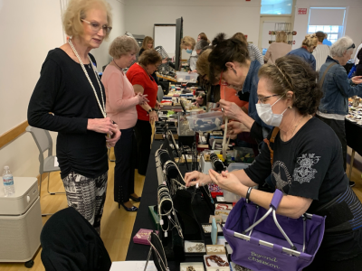 Shopping around for jewelry at the Friends of WML Jewelry Sale in 2022.