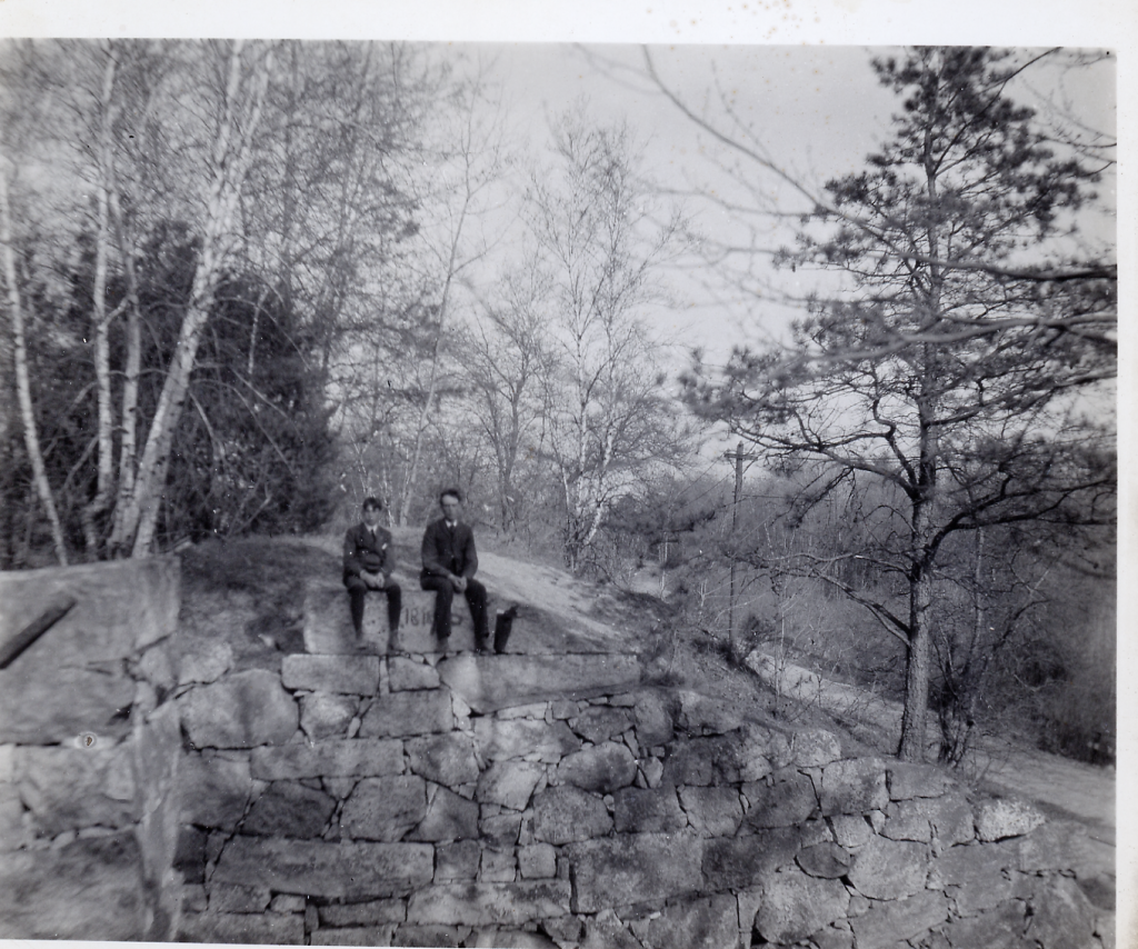 People Sitting on Aquaduct